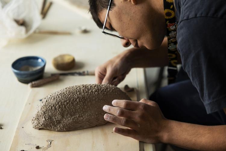 Neurodivergent students learn ceramics in art workshop
