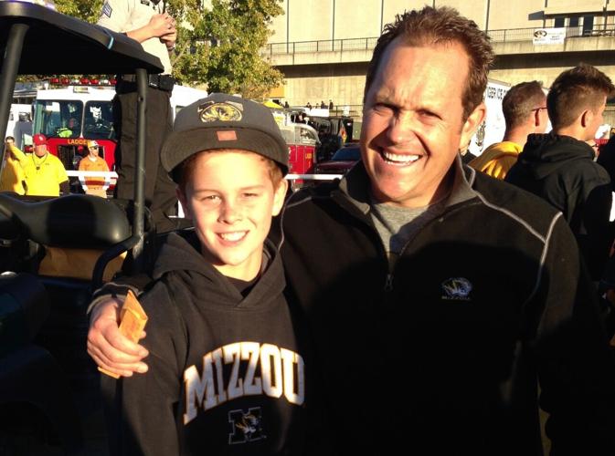 Brady Cook as a kid with his dad, Jim Cook